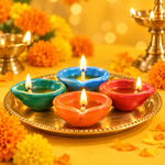 Set of colourful ceramic diyas lit for Diwali