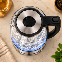 Electric glass kettle with illuminated blue LED base, top view