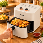 Manual Air Fryer in cream with fries and chicken wings, drawer open