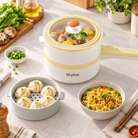Multifunction Electric Pan in Cream Yellow steaming dumplings and vegetables