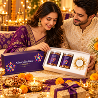 Couple admiring the Velvet Spice Glow Hamper during Diwali